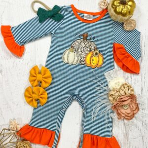Striped baby romper with pumpkin print and accessories.