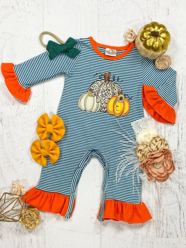 Striped baby romper with pumpkin print and accessories.