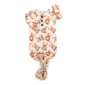 Baby sleeper gown with teddy bear pattern.