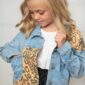 Girl wearing denim and leopard print jacket