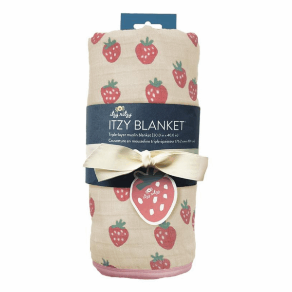 itzy ritzy itzy blanket™: giddy up! Strawberry-patterned muslin blanket rolled with ribbon.