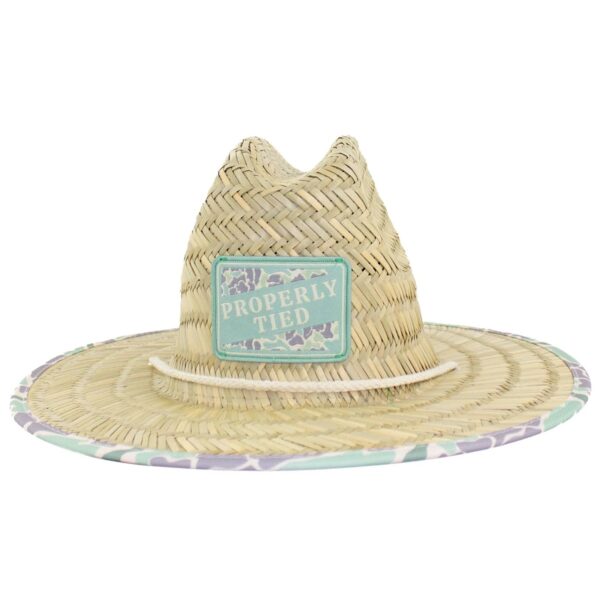 Straw hat with Properly Tied patch and floral trim.