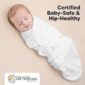 Sleeping baby in hip-safe swaddle, certified product.