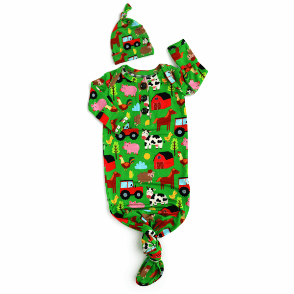 Green baby outfit with farm animal print