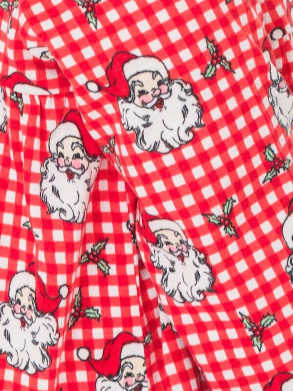 rufflebutts gingham plaid santa pajamas bamboo ruffled gown Red checkered fabric with Santa Claus pattern.