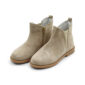 Beige suede ankle boots with scallop details.