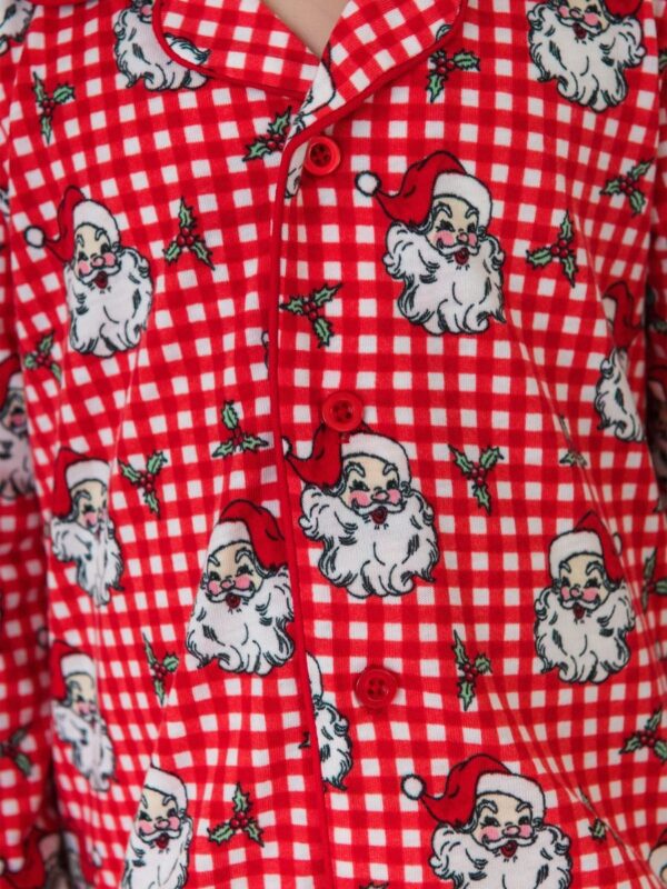 rufflebutts gingham plaid santa pajamas bamboo button down (ruffled) Red plaid pajama with Santa Claus design.