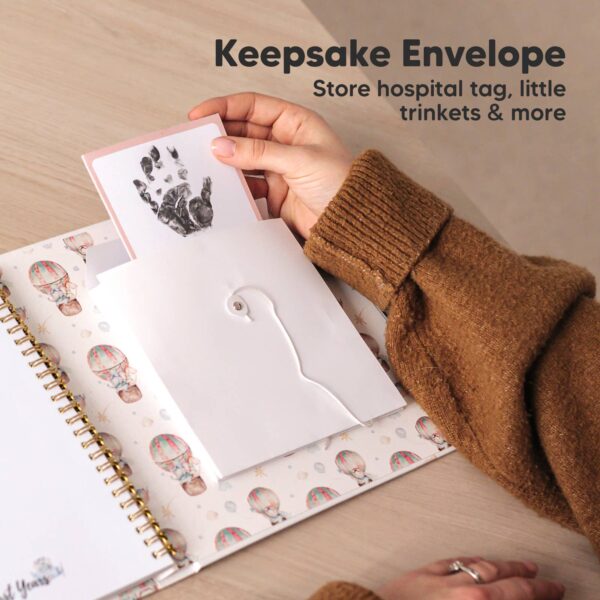 keababies keababies baby first years memory book: adventureland Hand holding envelope with baby handprint card.