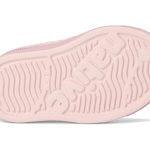 Pink shoe sole with wavy tread pattern
