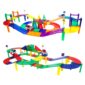 Colorful toy car track set with cars and signs.