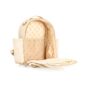 Open cream backpack with bee pattern interior.