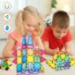 Children playing with colorful magnetic building blocks.