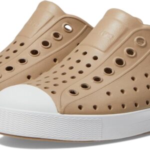 Tan slip-on sneakers with white soles