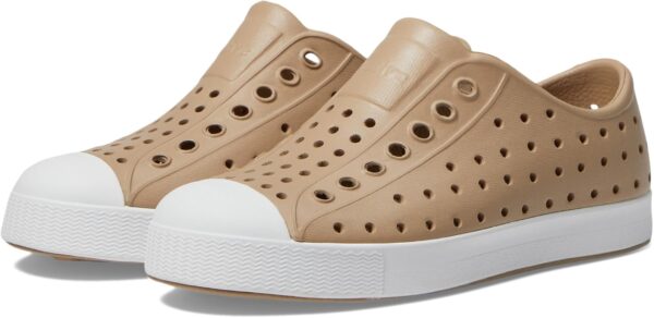 Tan slip-on sneakers with white soles