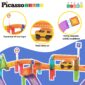 Colorful magnetic road track with toy car and signs.