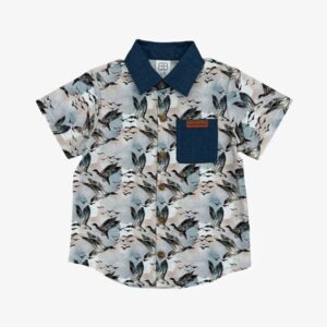 Bird-patterned shirt with denim collar and pocket.