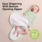 Baby sleeping in swaddle with bottom zipper open.