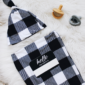 Black and white checkered baby blanket and hat
