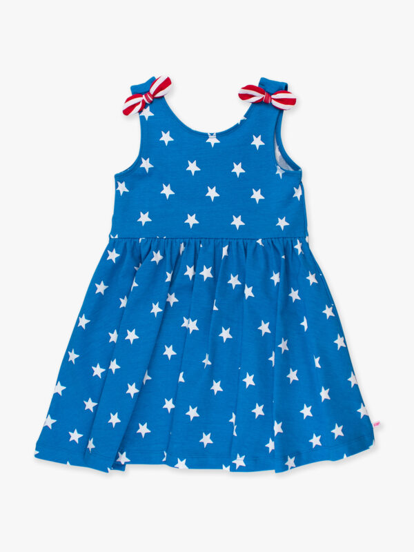Blue star-patterned dress with red bows