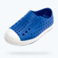Blue perforated slip-on shoe with white sole.