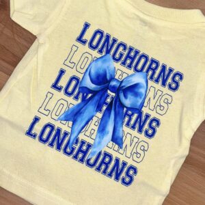 Shirt with Longhorns print and blue bow