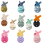 Colorful silicone pacifiers in various designs.