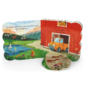 Children's book showing farm scene with red barn.
