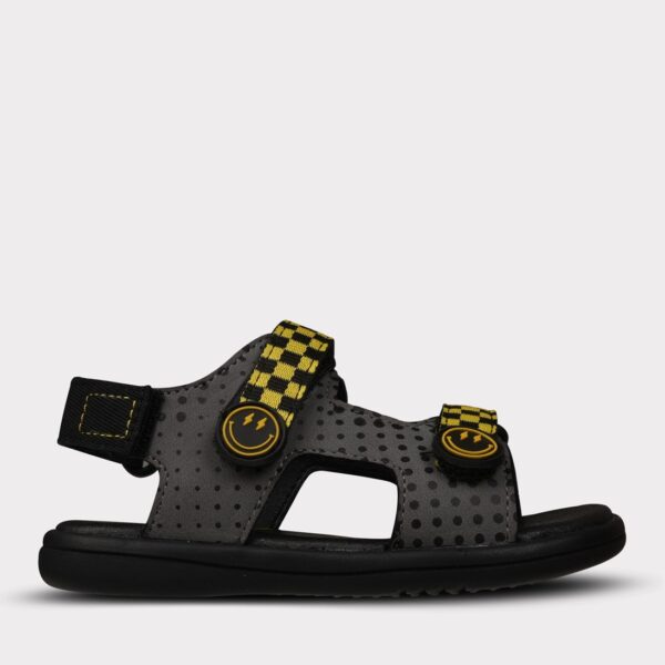 Black and gray polka dot sandals with smiley buckles.