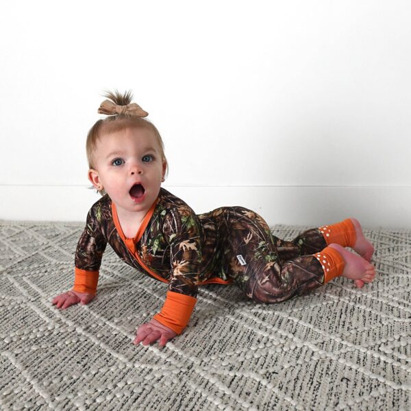 gigi and max hunter camo zip sleepies little bamboo baby outfit Baby in camo outfit crawling on carpet