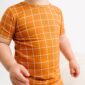 Child in orange checkered outfit.