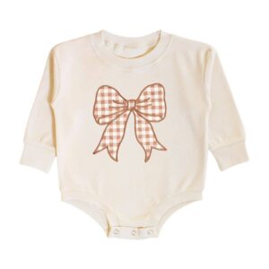 Cream baby bodysuit with gingham bow design.