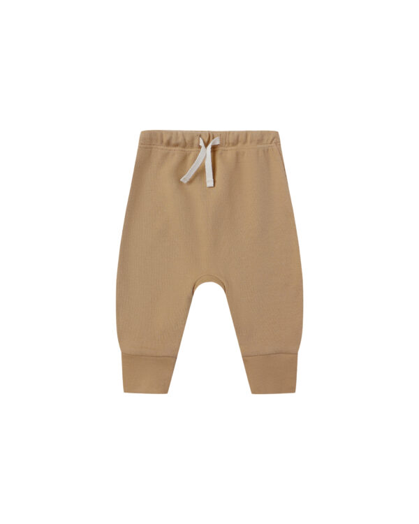 Beige toddler pants with drawstring waist.