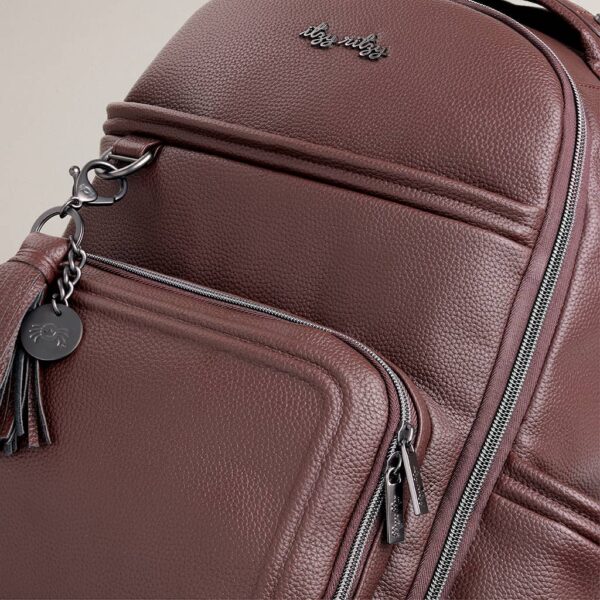 itzy ritzy *new* espresso boss plus™ Brown textured backpack with zippers and tassel detail.