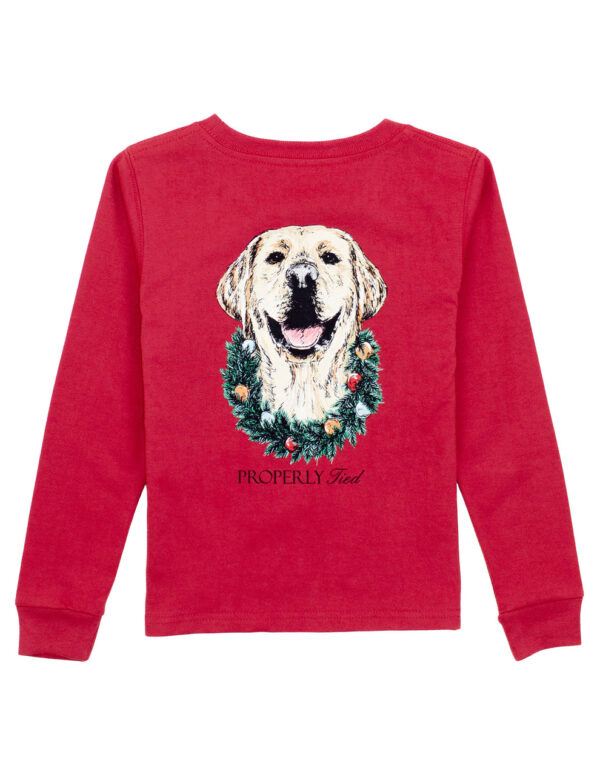 Red sweater with dog and wreath design