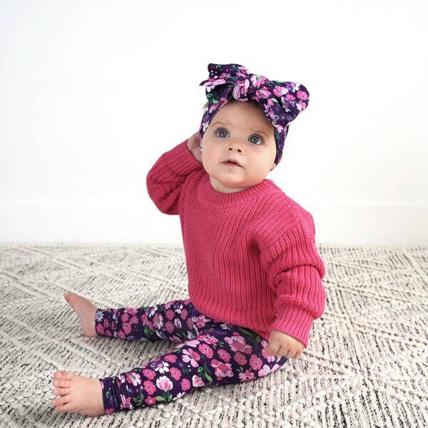 gigi and max mila leggings and sweater set Baby in pink sweater with floral headband.