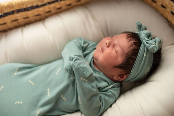 three little tots arrow print knotted newborn baby gown pajamas Sleeping baby in green outfit and headband