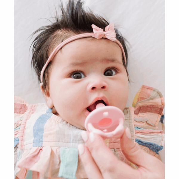 itzy ritzy sweetie soother™ pacifier sets (2 pack): agave + succulent cables Baby with pacifier and headband