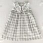Plaid dress with lace collar for infants.