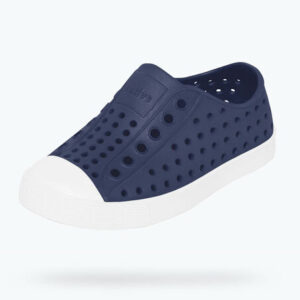 Navy slip-on shoe with white sole.
