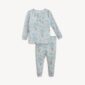 Children's pajamas with deer and tree print design.