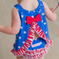 Baby wearing patriotic star and stripe outfit