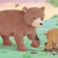Bear family walking through a colorful forest field.