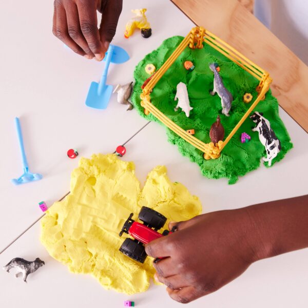 faber castell / creativity for kids sensory pack farm on the go sensory play set for kids Child playing with toy farm animals and tractor.