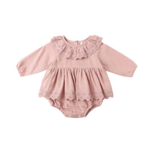 Pink baby dress with lace details.
