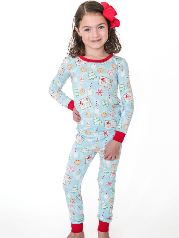 rufflebutts santa sweets pajamas Child wearing festive Christmas pajamas.
