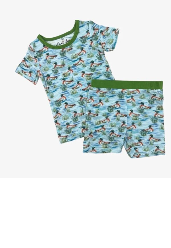 Children's pajamas with colorful duck pattern.