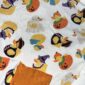 Festive rubber duck pajamas with Halloween designs.