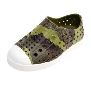 Green and black perforated slip-on shoe.