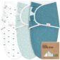 Three space-themed baby swaddle wraps with packaging.