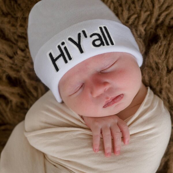 www.ilybean.com hi y'all baby hat newborn and baby hospital hat pink Sleeping baby wearing 'Hi Y'all' hat.